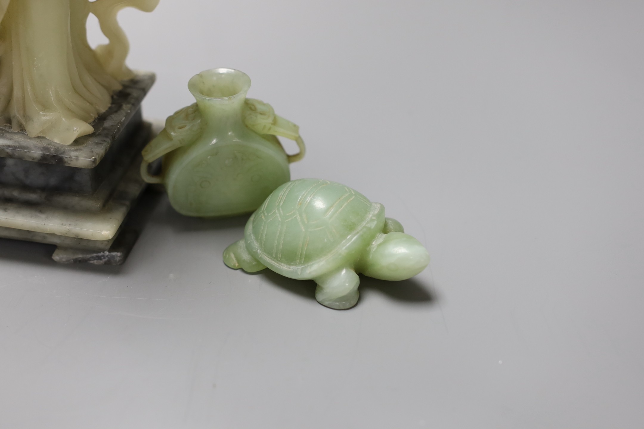 A soapstone figure, a nephrite censer and two hardstone carvings tallest 25cm
